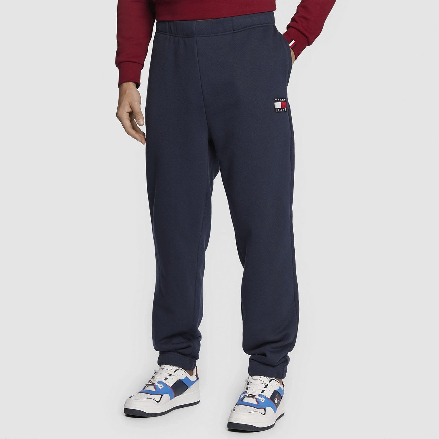 TOMMY JEANS Pantaloni de trening Badge DM0DM14272 C87 Bleumarin