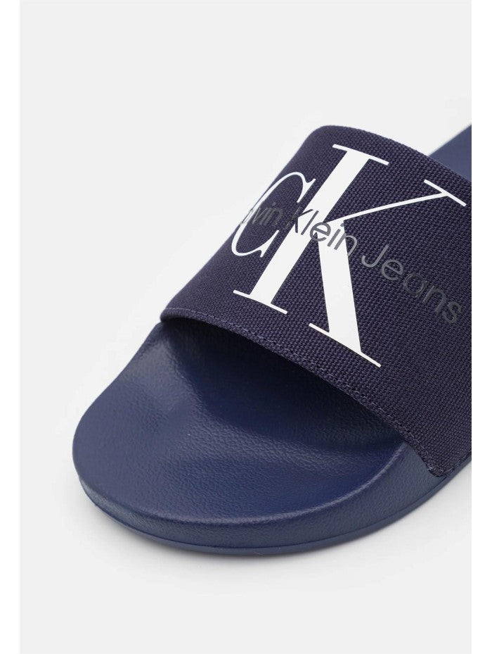 CALVIN KLEIN JEANS Șlapi Slide Monogram Co YM0YM00061 0GY Albastru