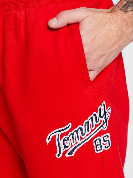TOMMY JEANS Pantaloni de trening DM0DM15807 Roșu