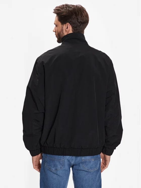 TOMMY JEANS Jachetă Essential DM0DM15916 Negru