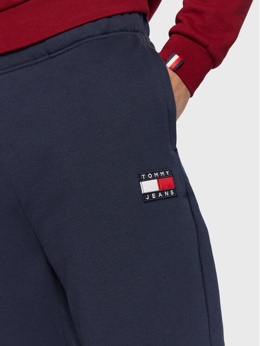 TOMMY JEANS Pantaloni de trening Badge DM0DM14272 C87 Bleumarin